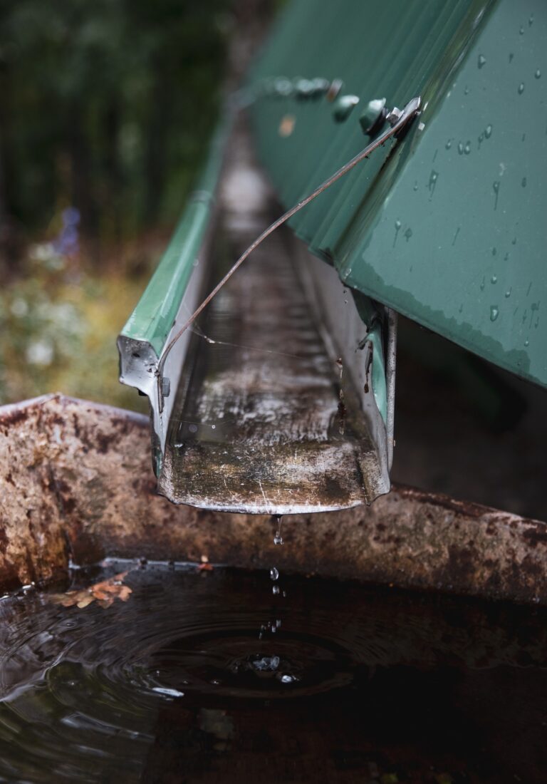 vertical-closeup-roof-drain-pipe (1)